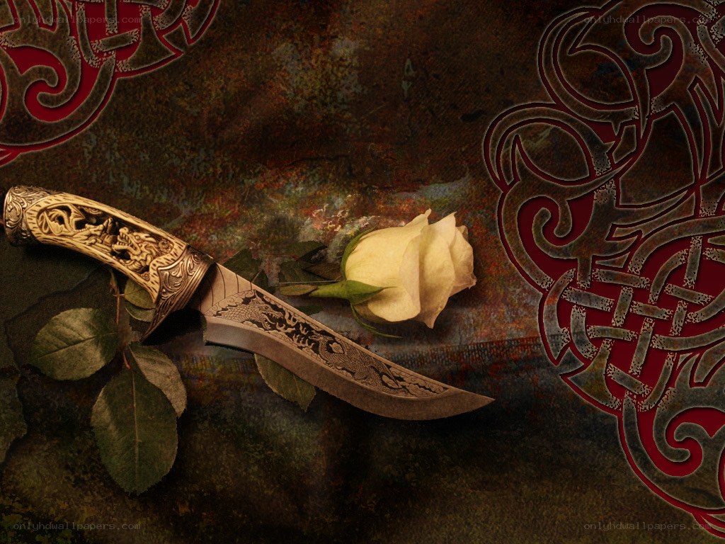 ornate dagger with rose