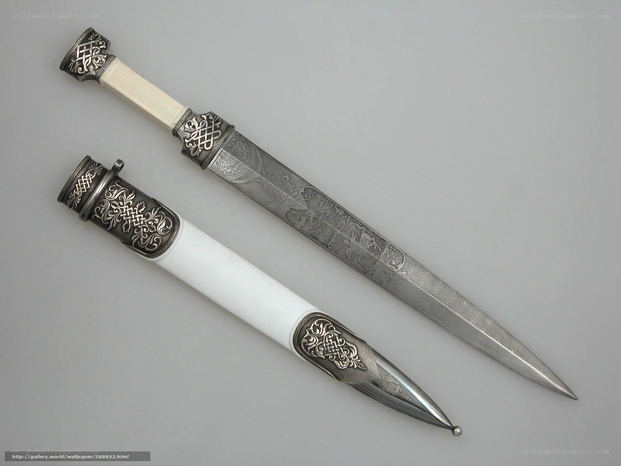 ornate dagger with scabbard