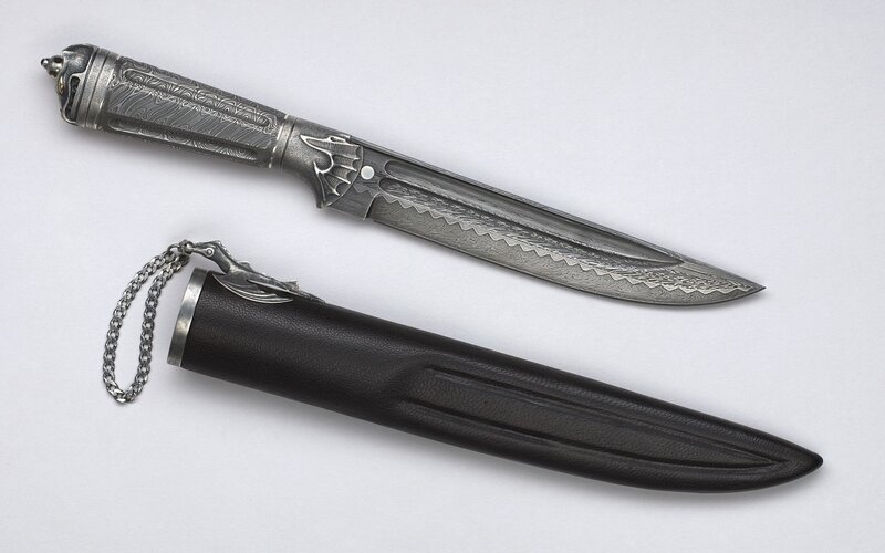 ornate dagger with sheath