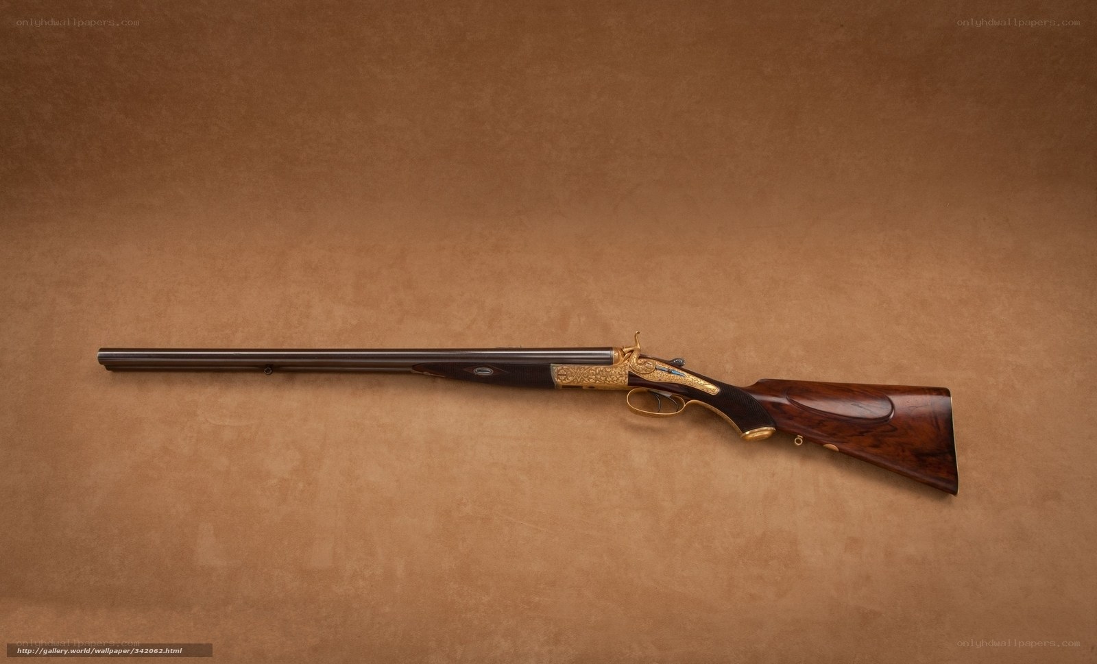 ornate double-barreled shotgun