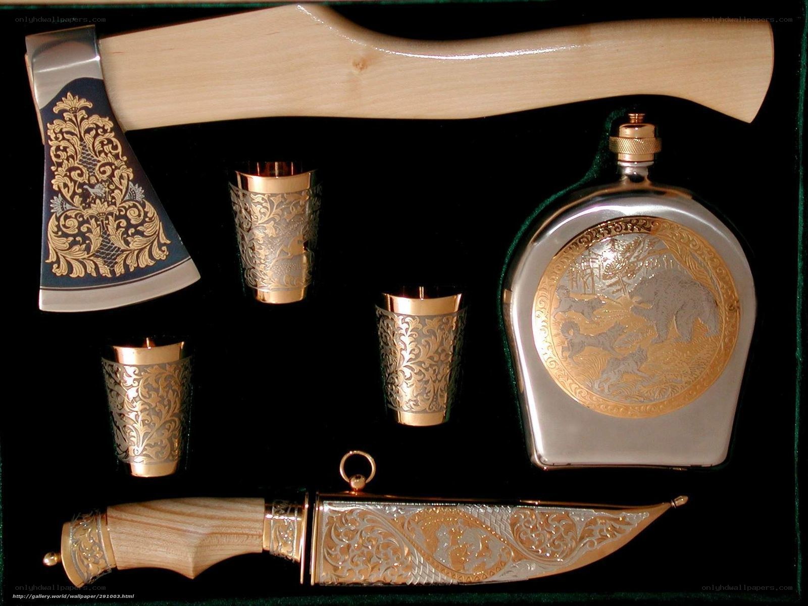 ornate drinking set with axe and knife