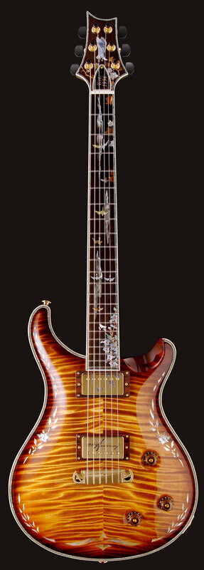 ornate electric guitar with bird inlays