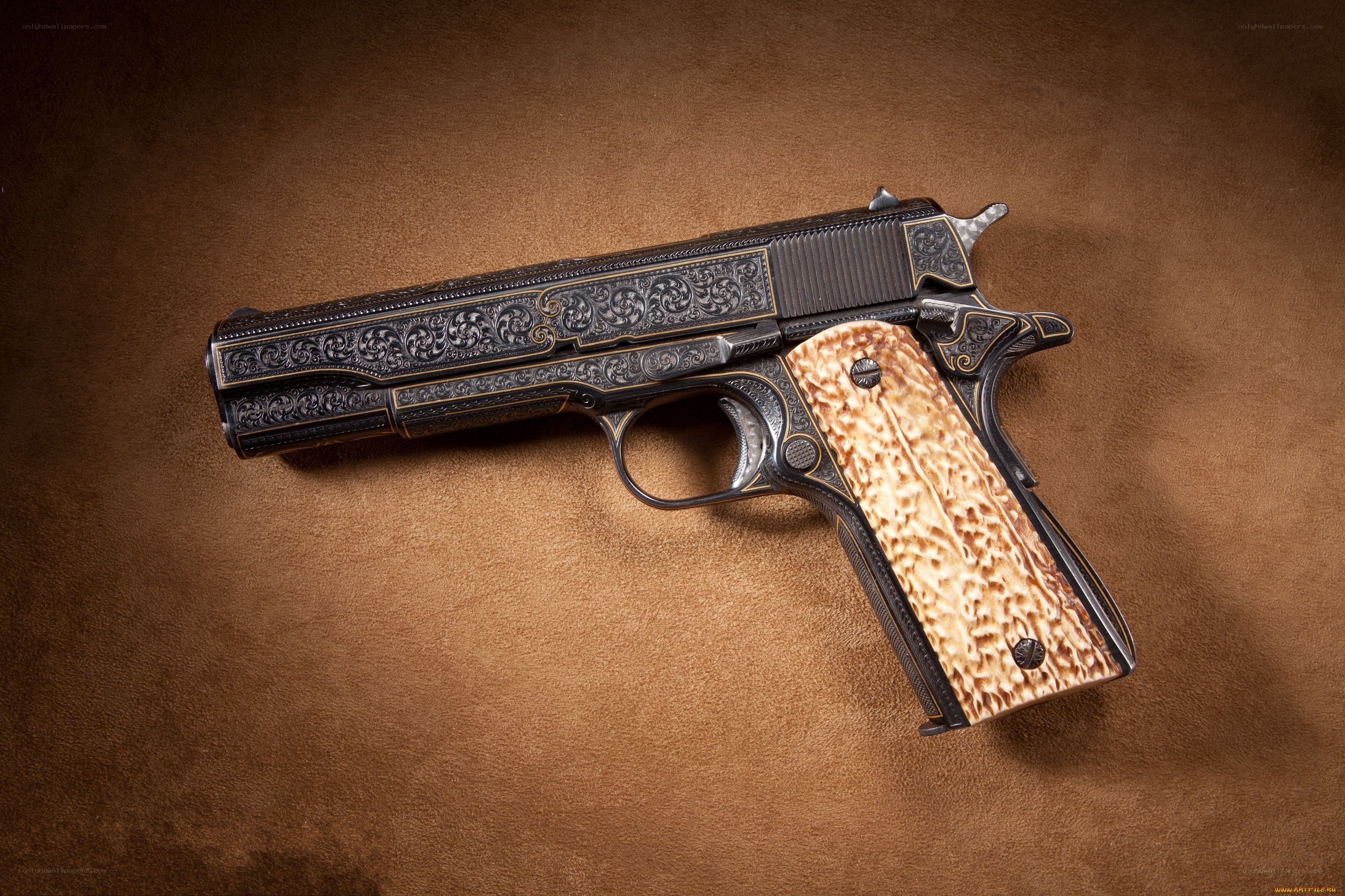 ornate engraved pistol