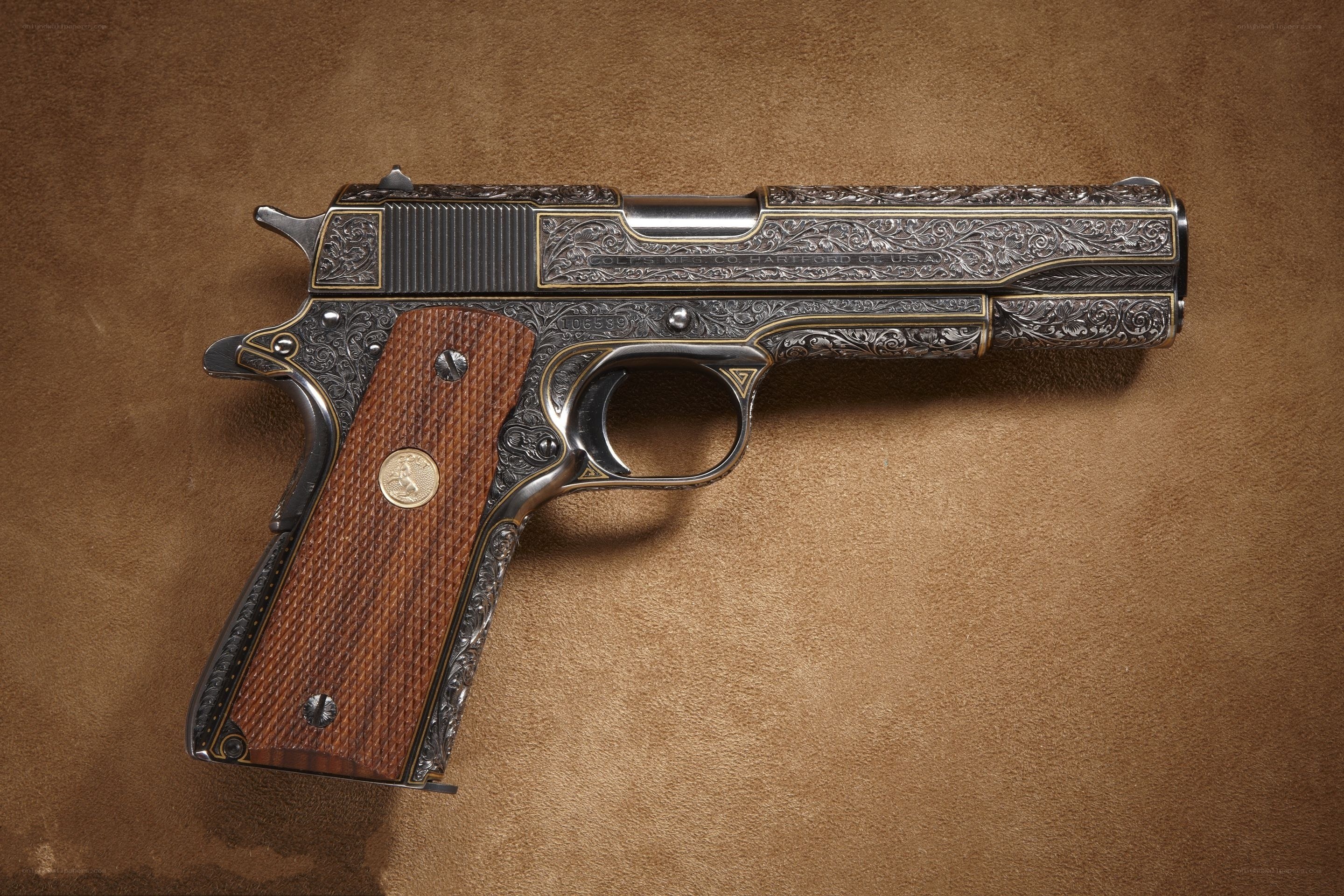 ornate engraved pistol