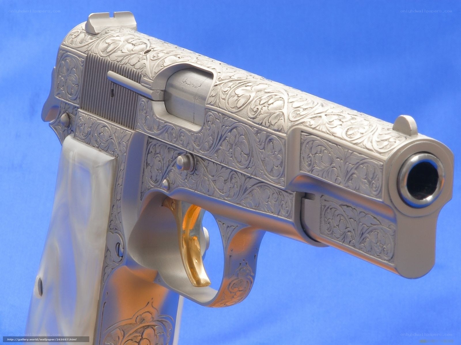 ornate engraved pistol