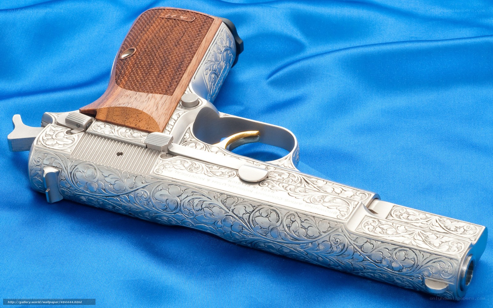 ornate engraved pistol