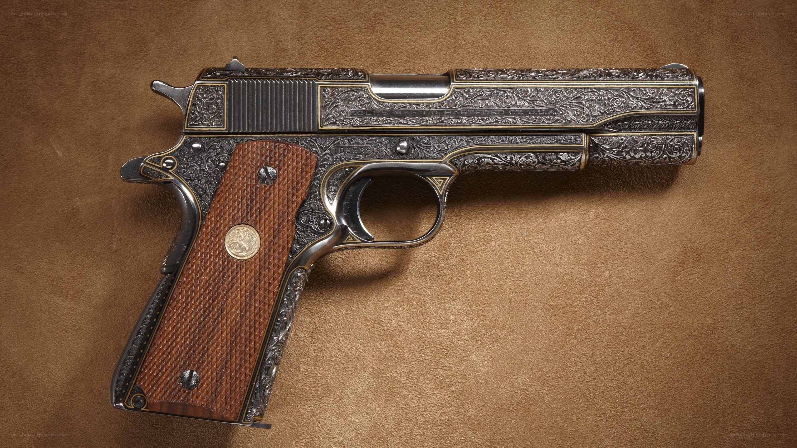 ornate engraved pistol