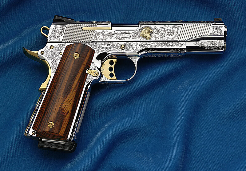 ornate engraved pistol