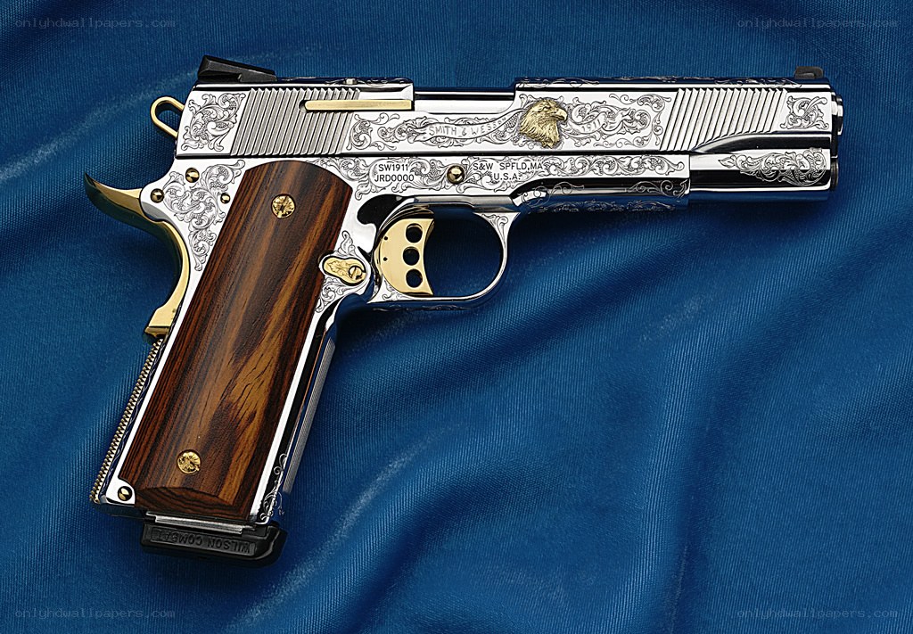 ornate engraved pistol