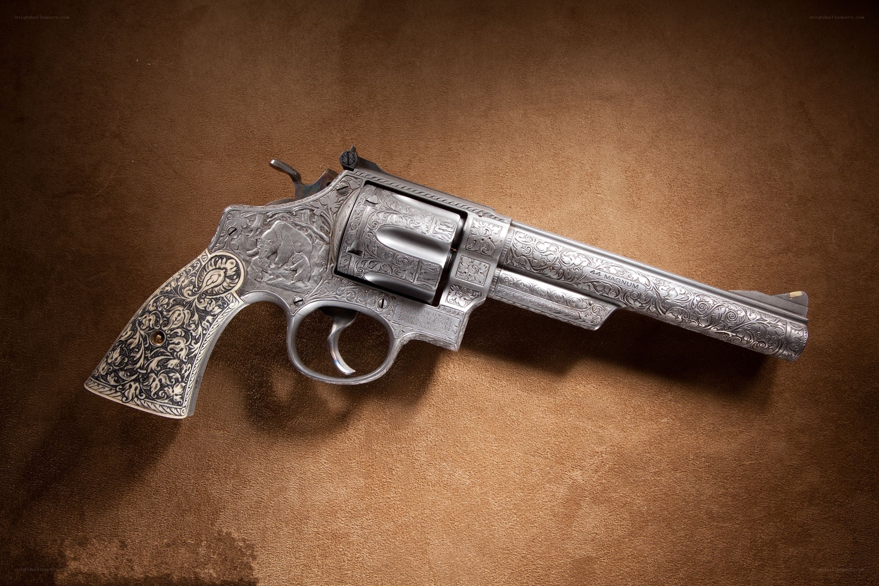 ornate engraved revolver