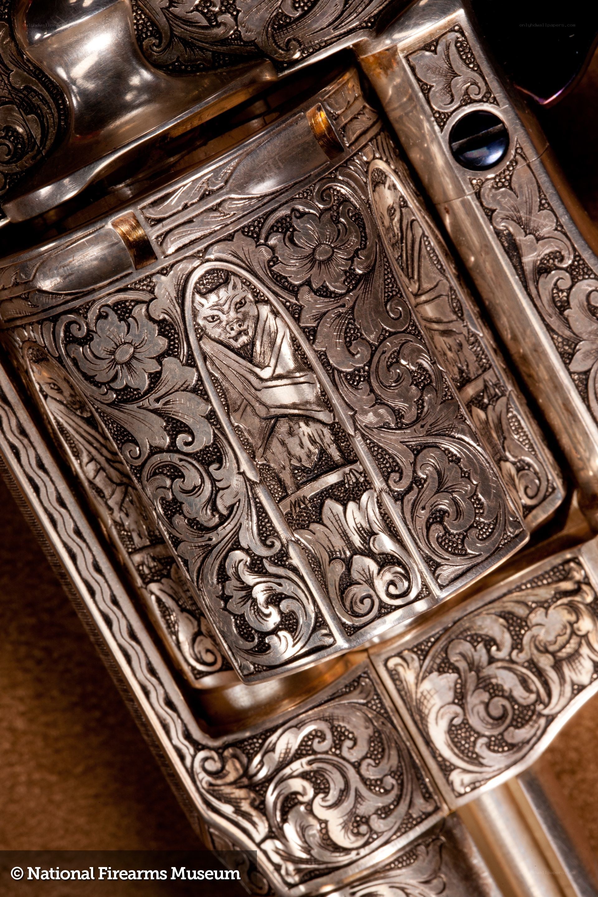 Ornate engraved revolver