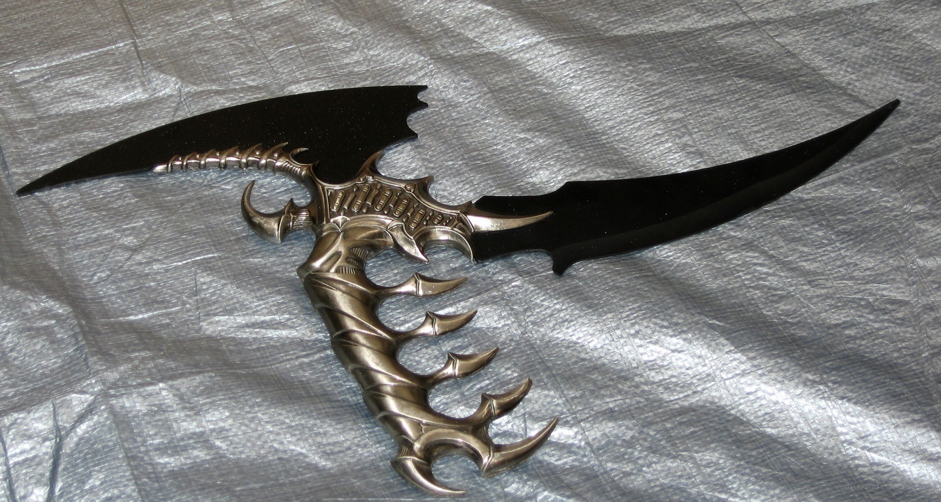 ornate fantasy dual-bladed weapon