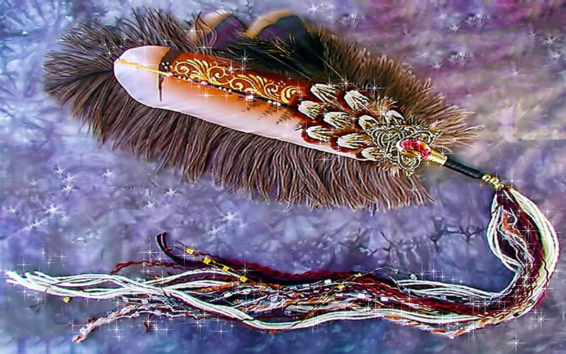 ornate feather with tassels