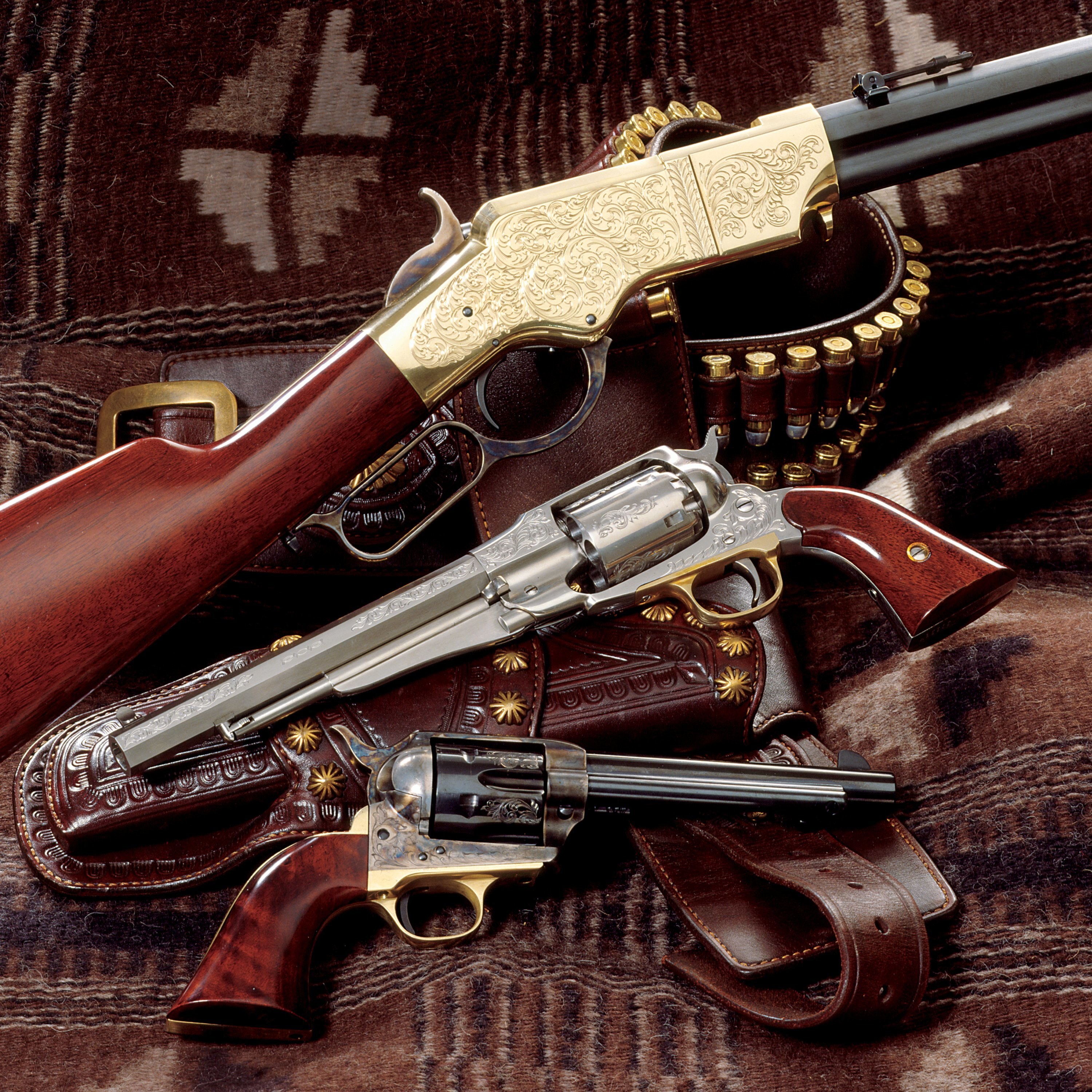 ornate firearms on blanket