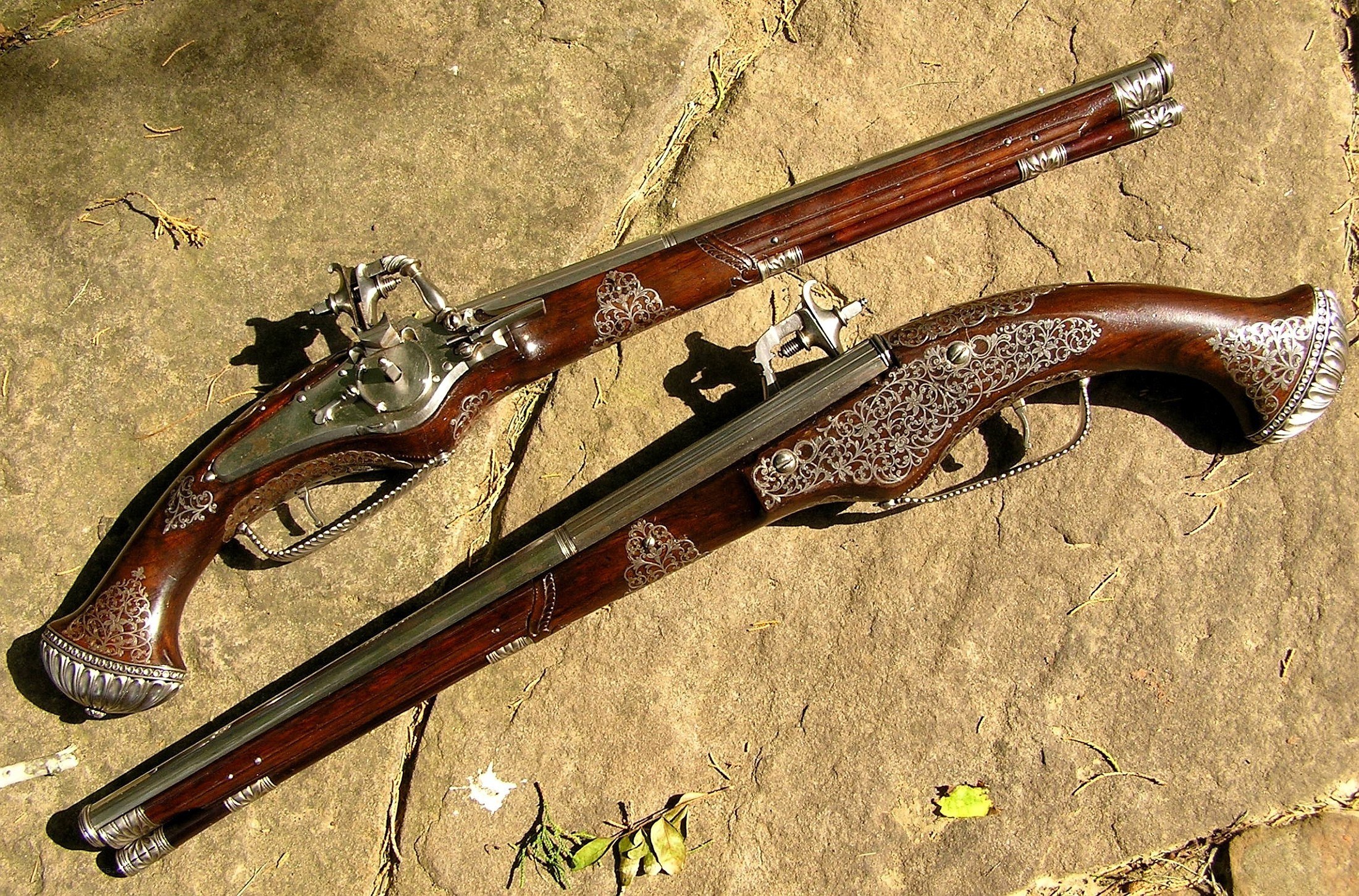 ornate flintlock pistols