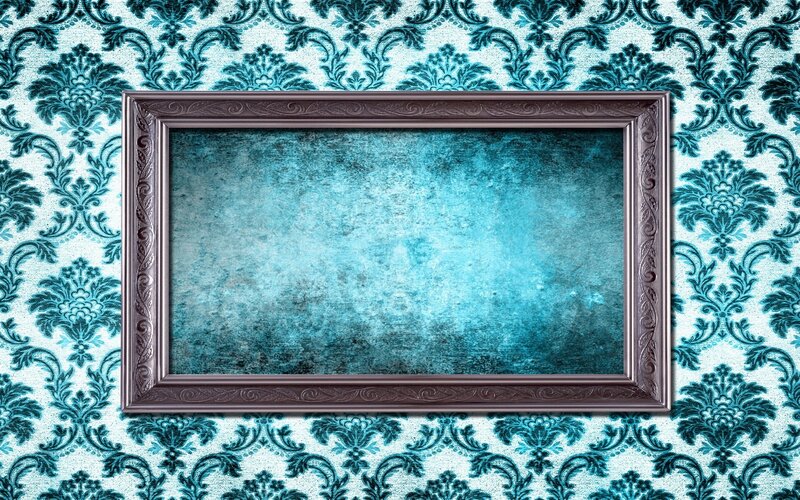 ornate frame on patterned wall