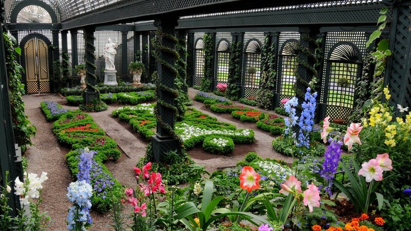 ornate garden with floral beds