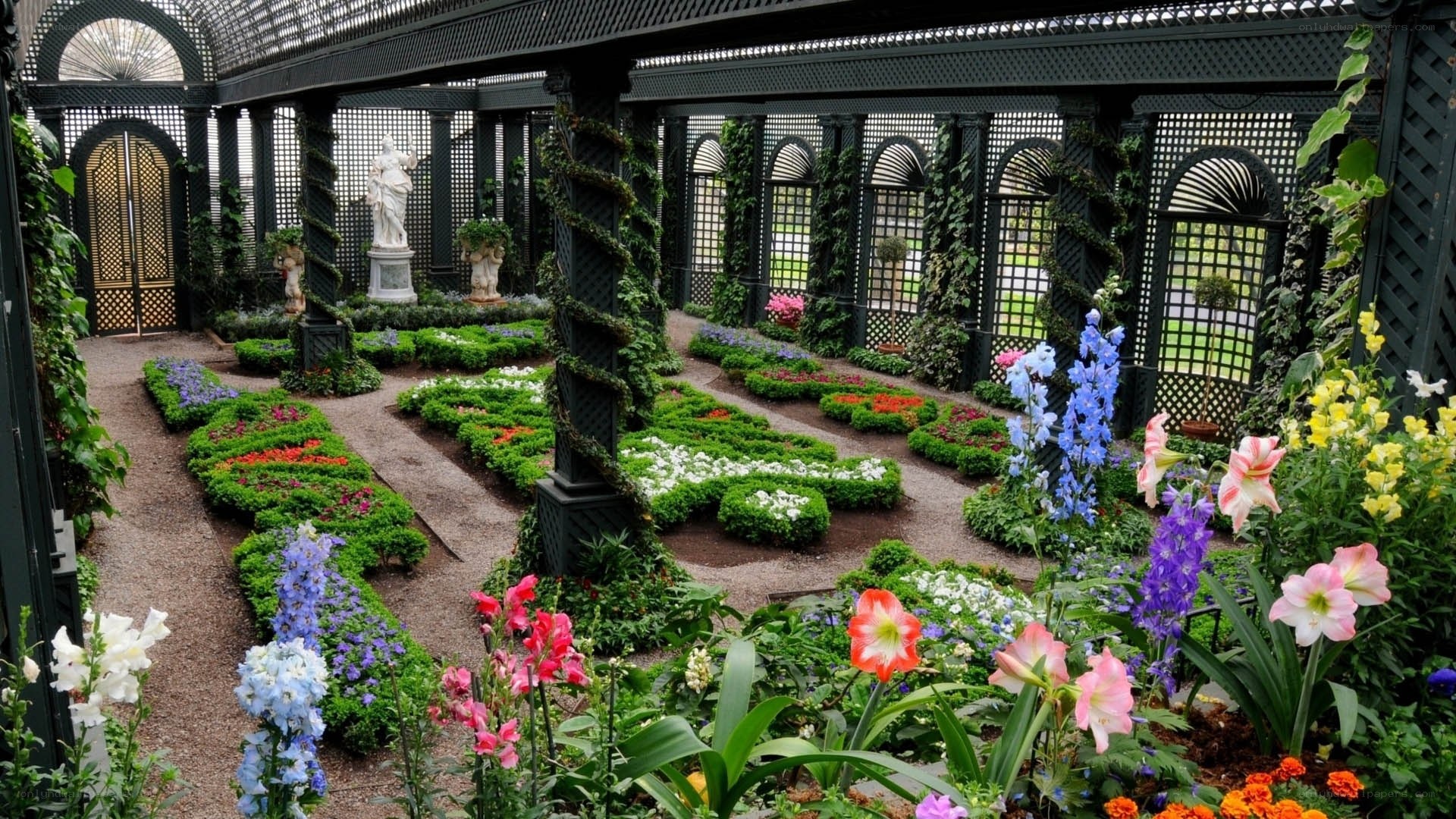 ornate garden with floral beds