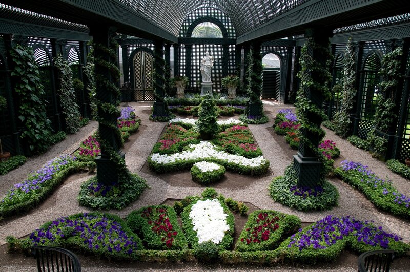 ornate garden with statue