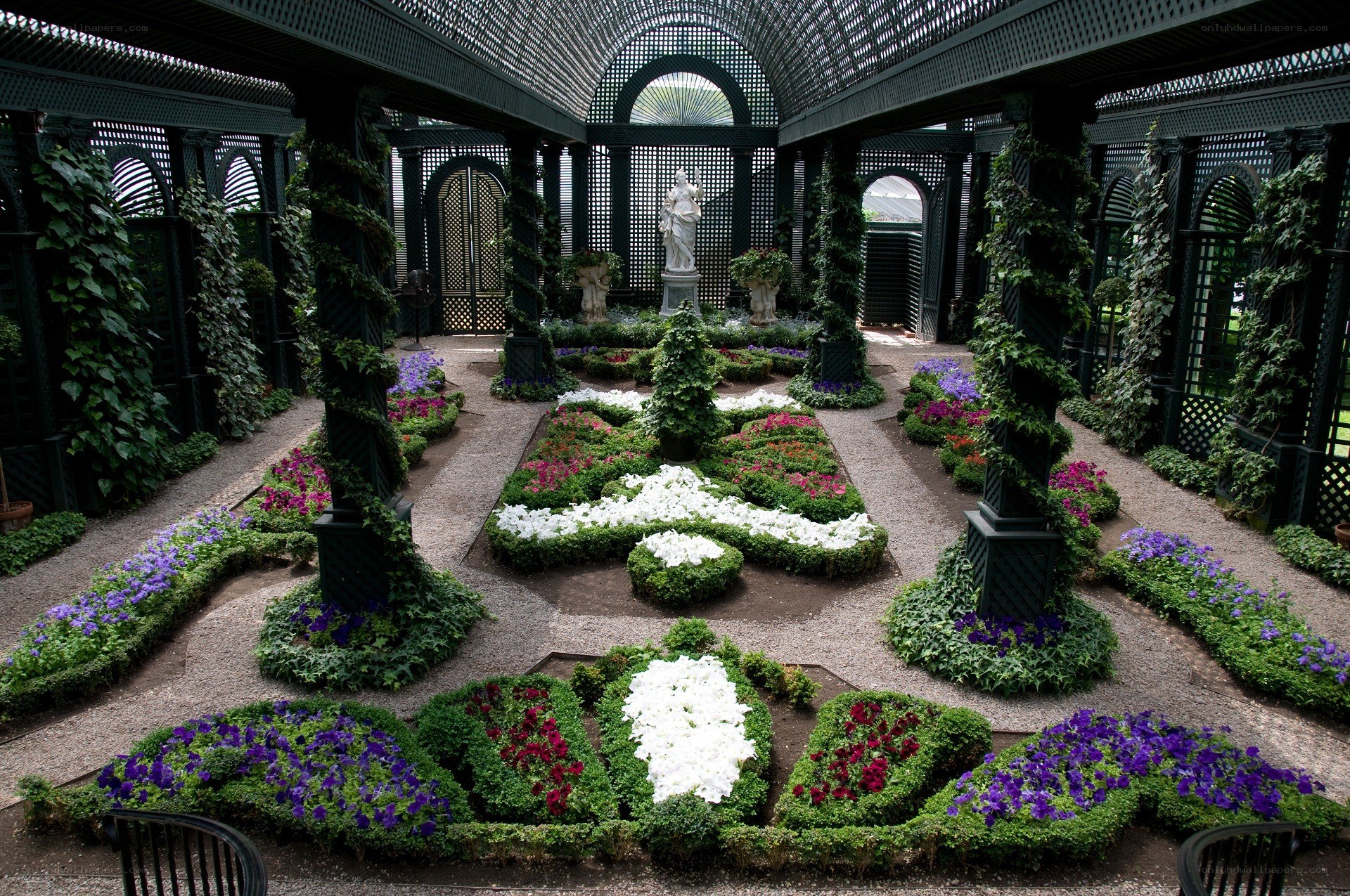ornate garden with statue