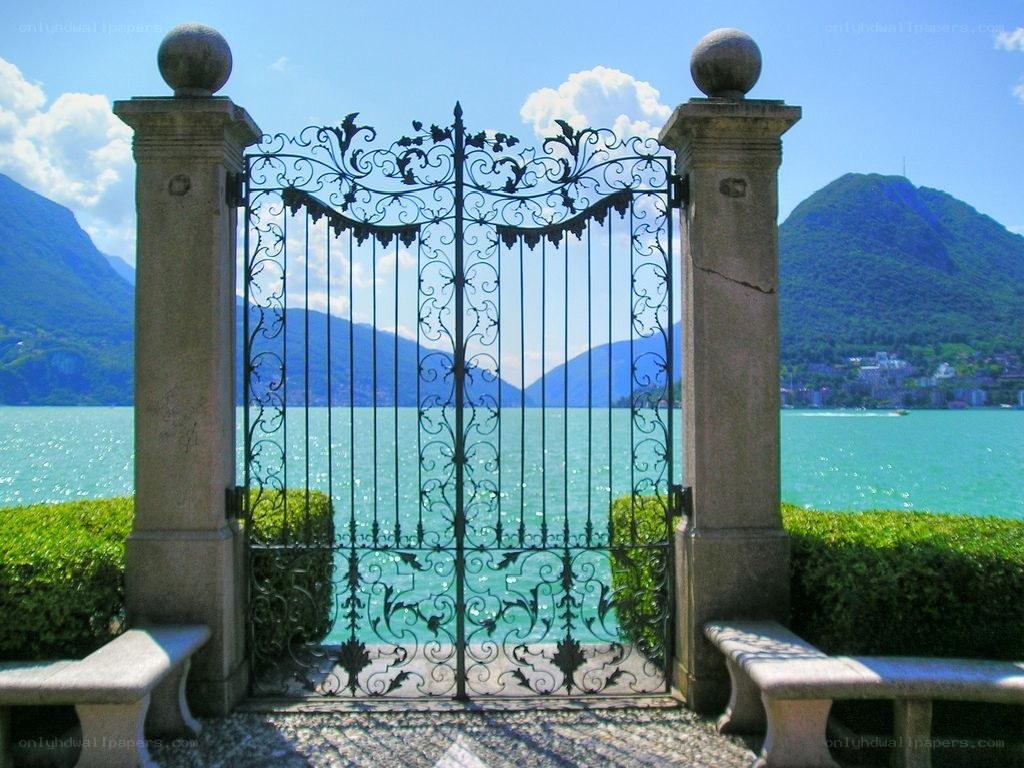 Ornate gate overlooking a lake