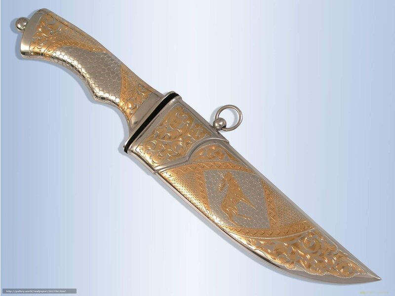 ornate gold and silver dagger