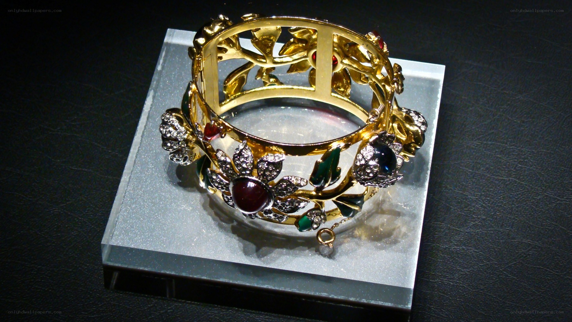 ornate gold bracelet with gems