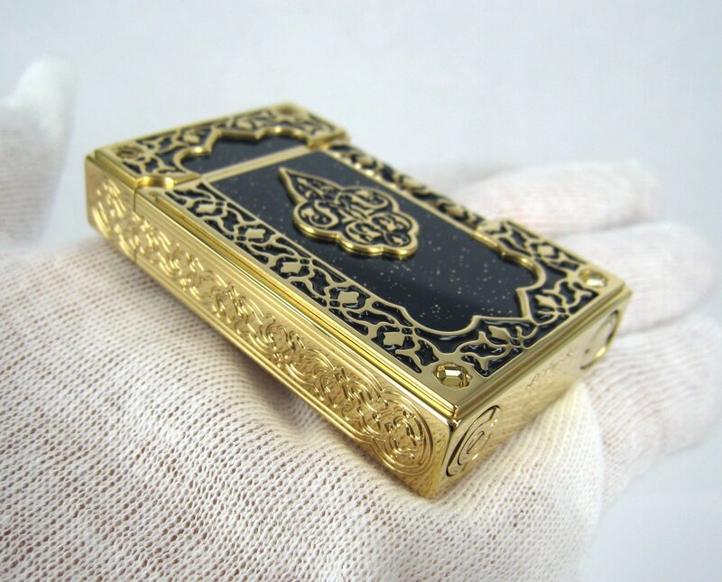 Ornate Gold Lighter — Neutral, Photograph, Hand