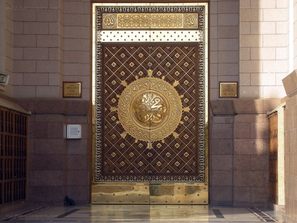 ornate golden door at a mosque