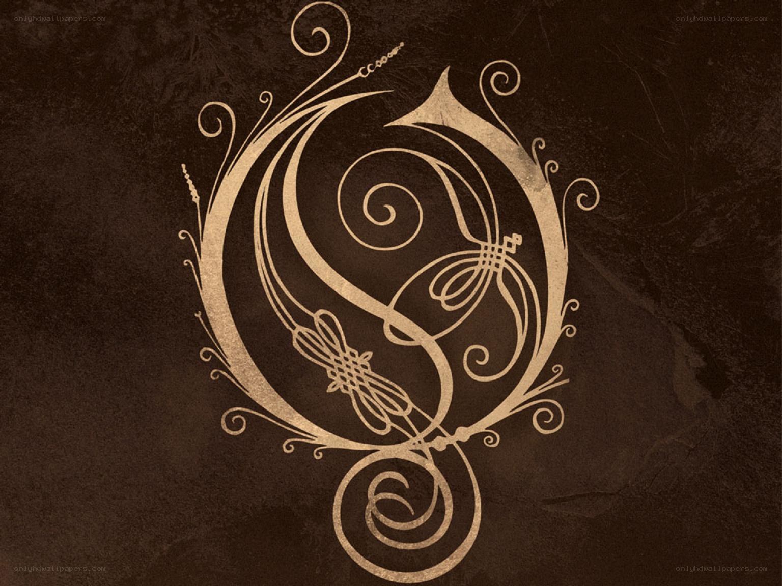 ornate golden emblem on dark background