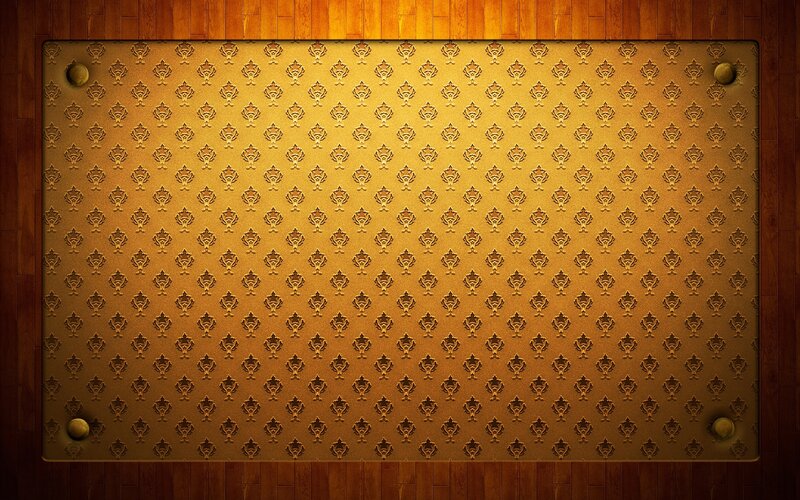 ornate golden pattern on wood