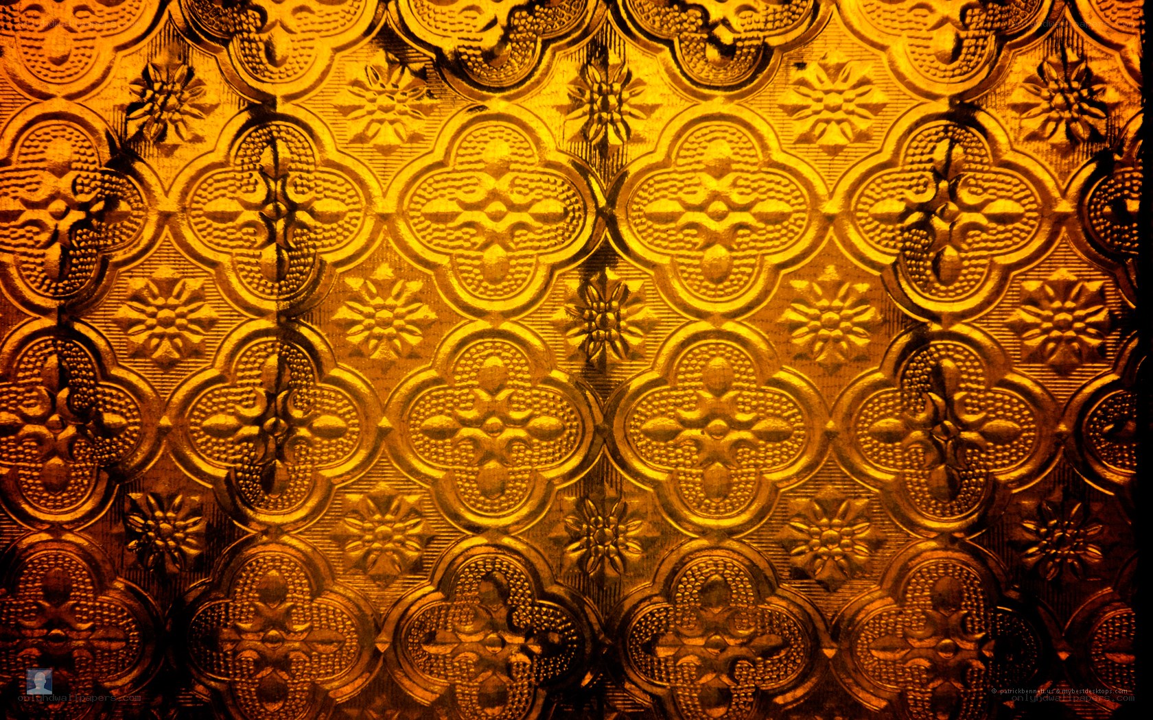 ornate golden patterned glass