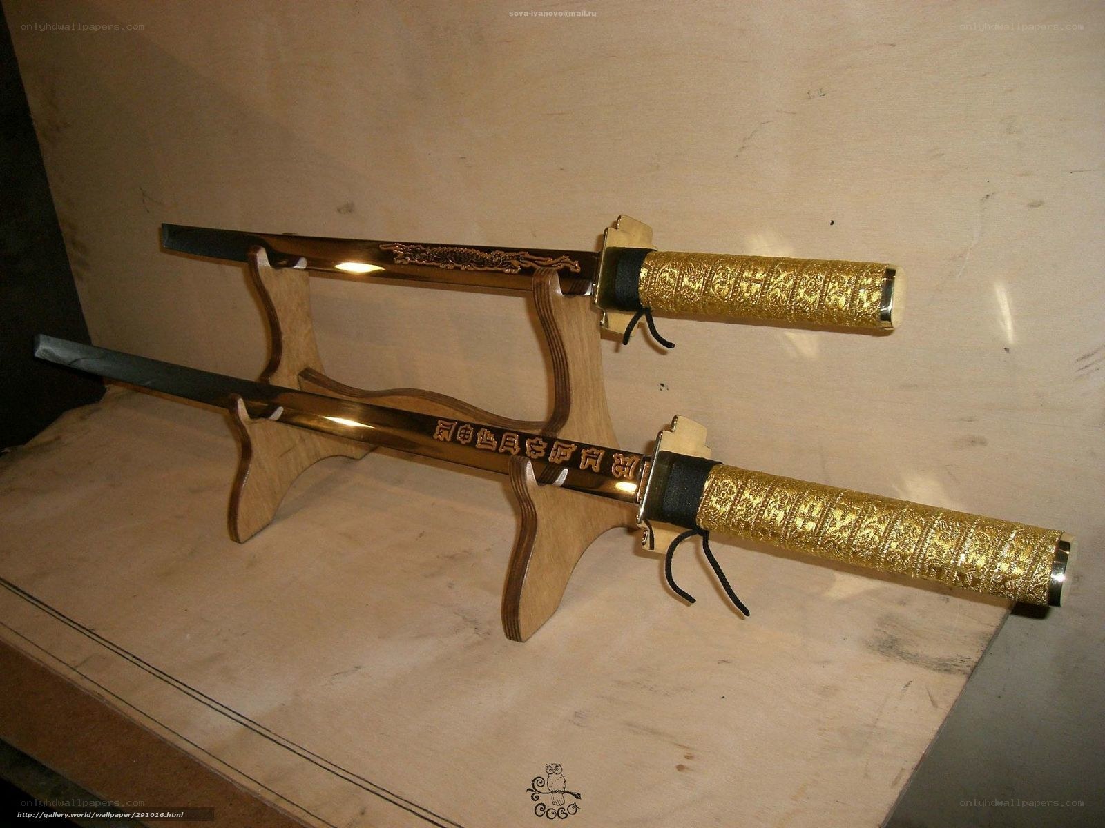 ornate golden swords on stand