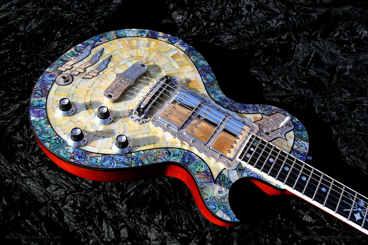 ornate inlaid electric guitar