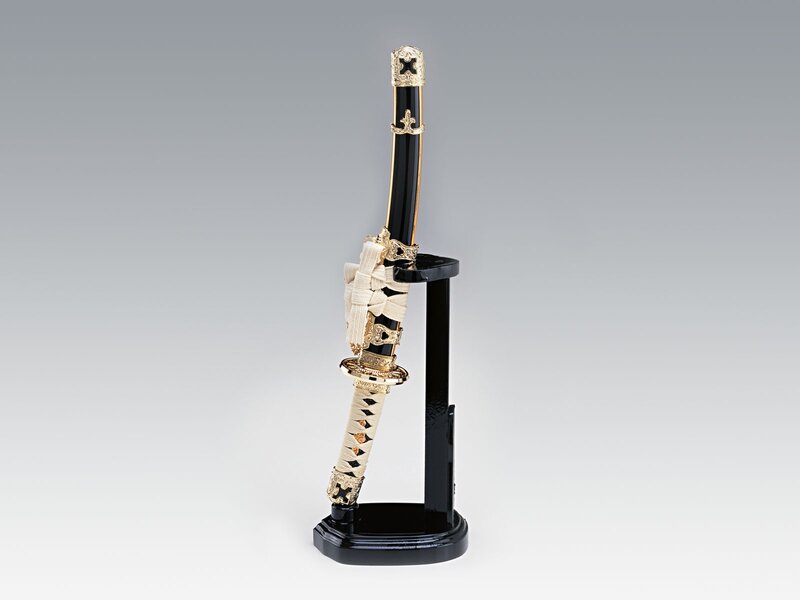 ornate katana on display stand
