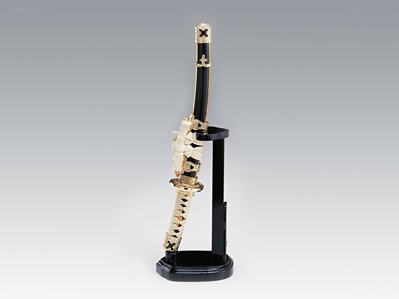 ornate katana on display stand