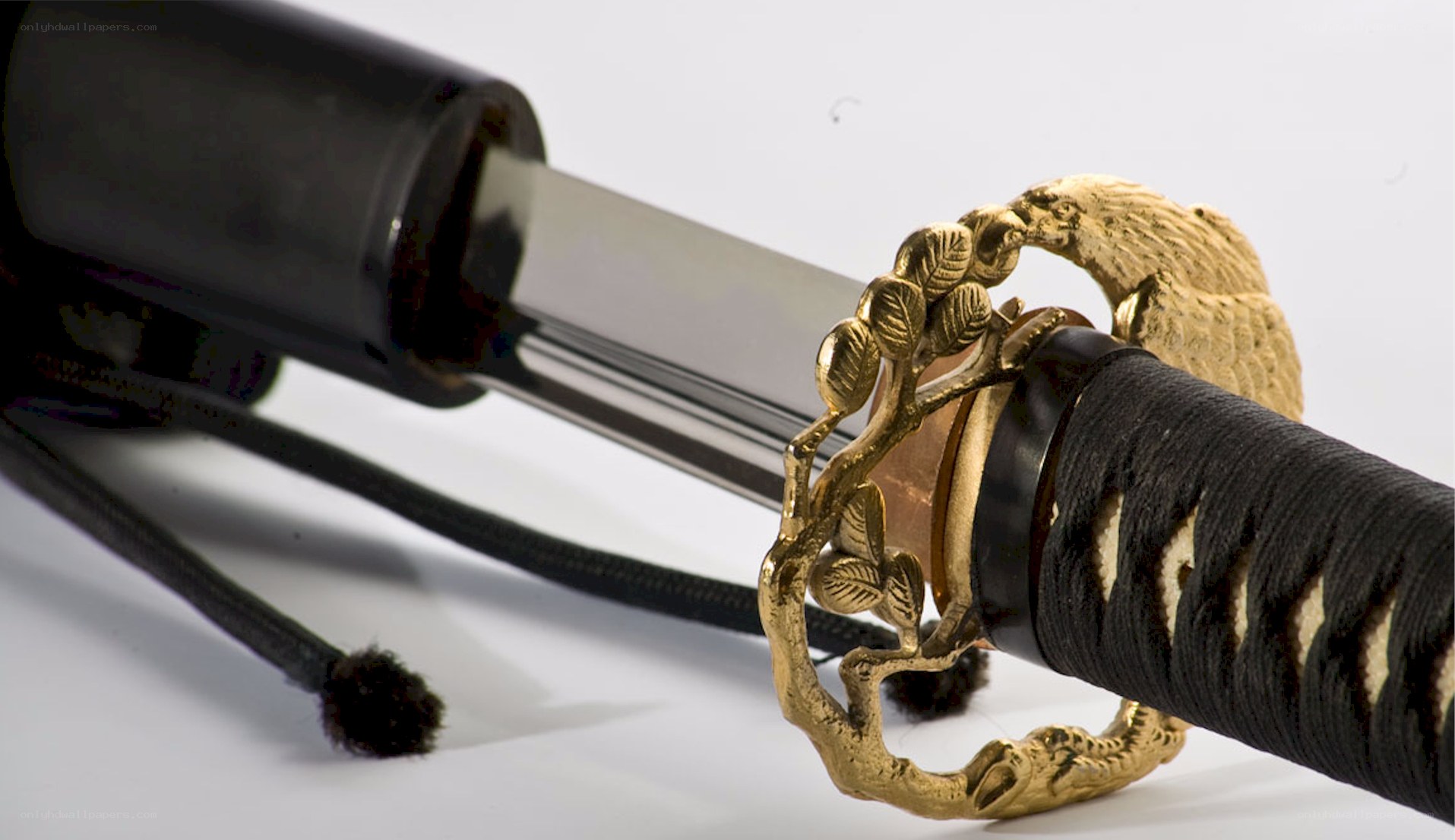 ornate katana with golden tsuba