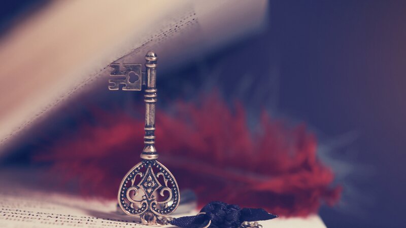 Ornate Key on Book — Silver