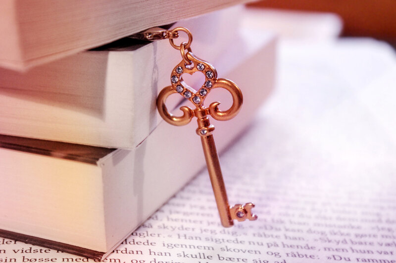Ornate Key on Books