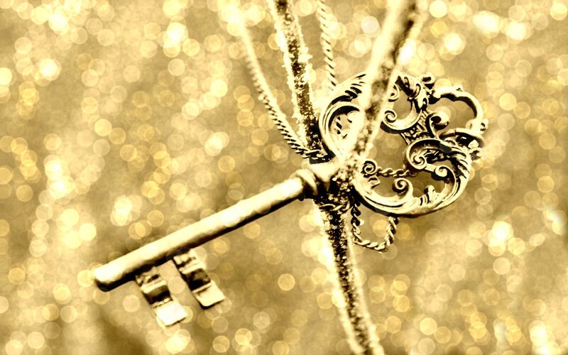 Ornate Key on Branch — Gold