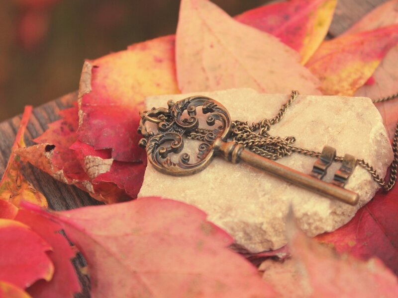 Ornate Key on Stone — Red
