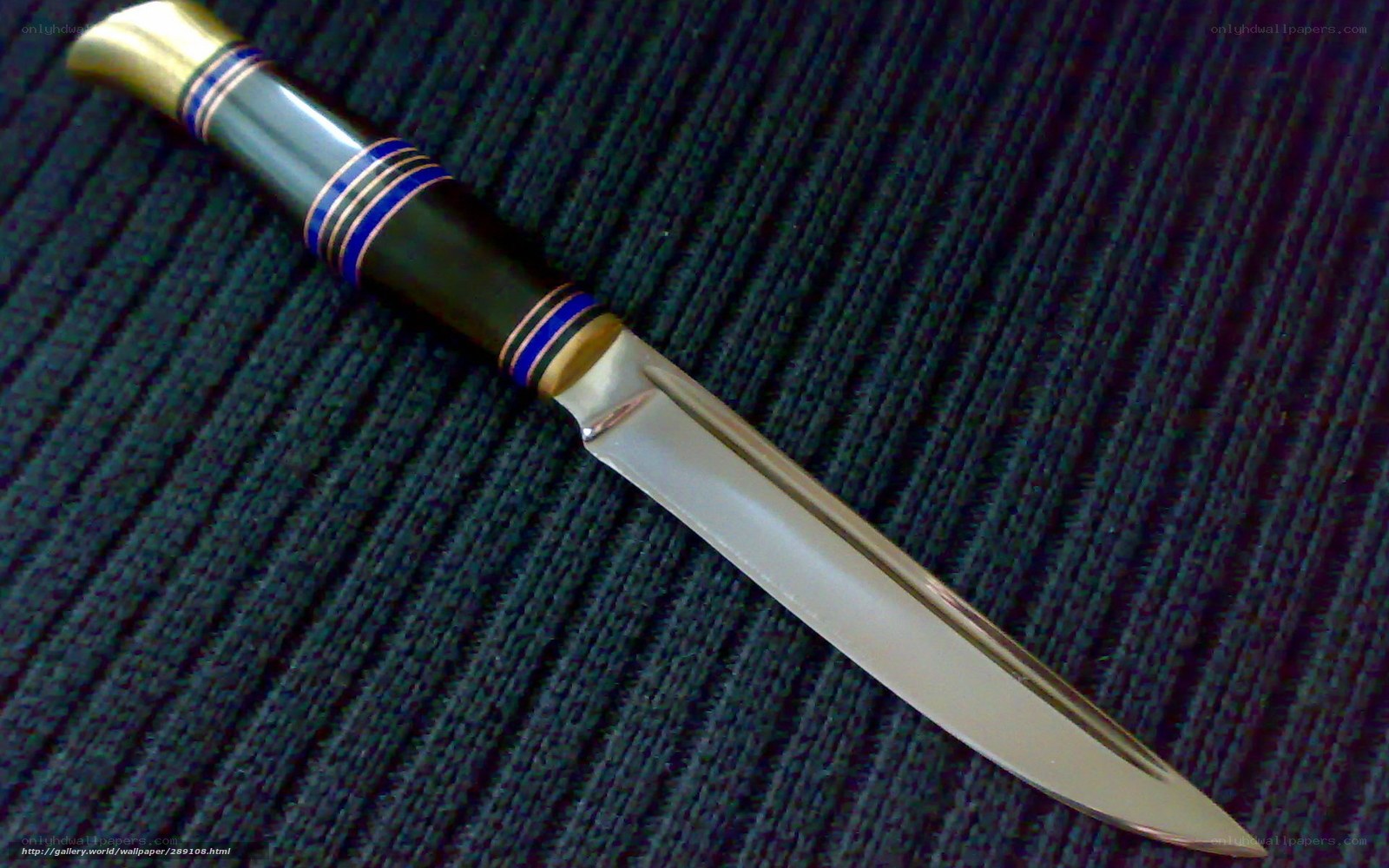 ornate knife on fabric