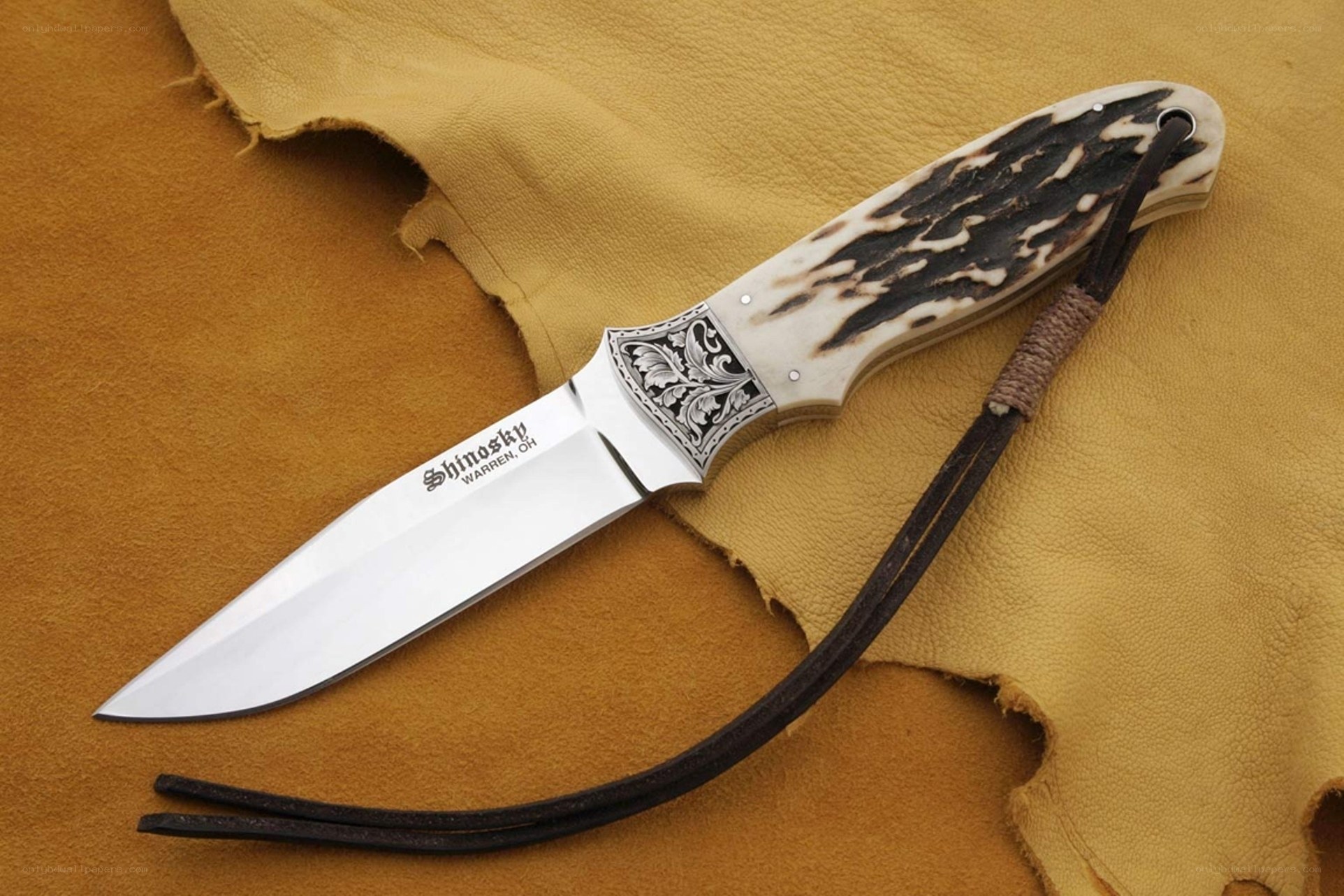 ornate knife on leather