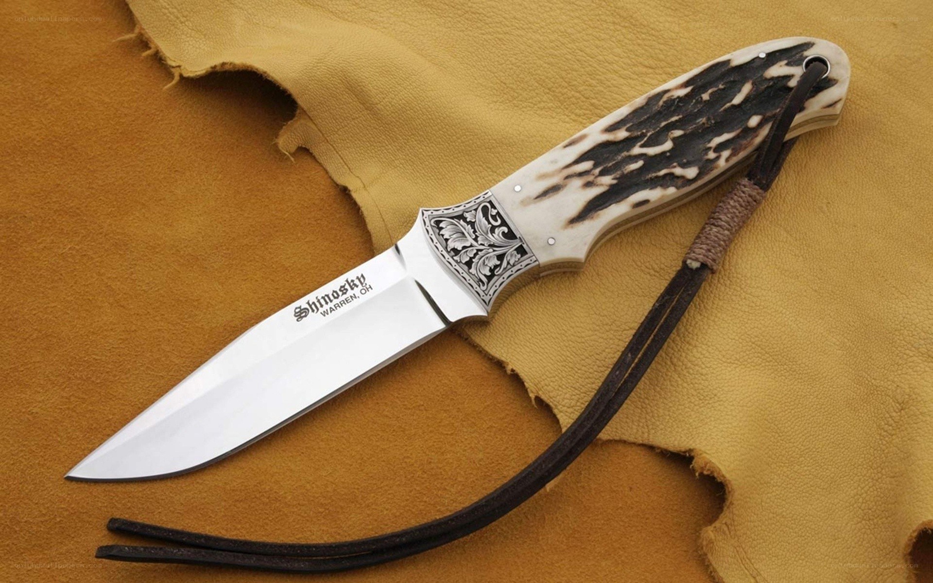 ornate knife with antler handle