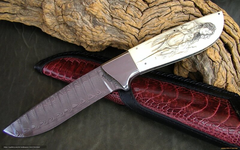 ornate knife with carved handle