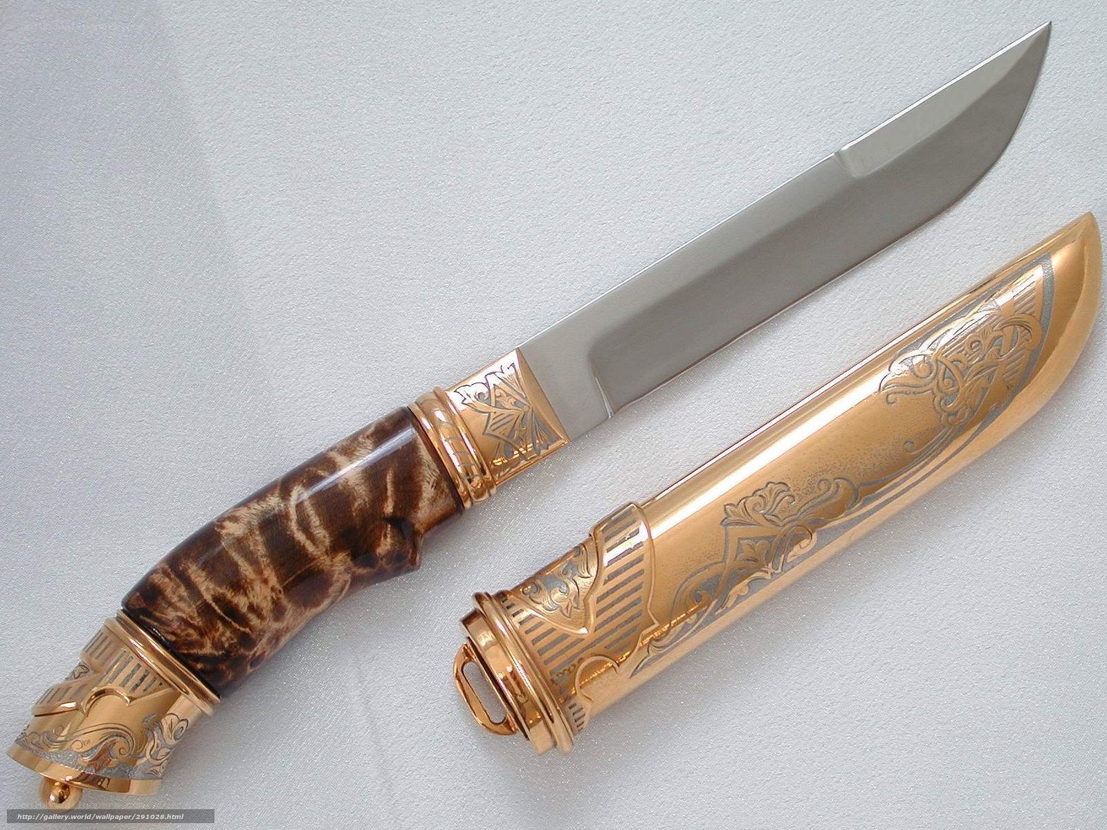 ornate knife with gold sheath