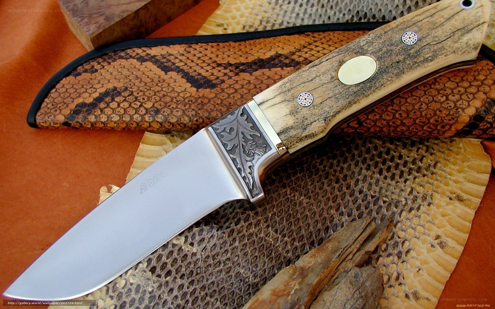 ornate knife with wooden handle