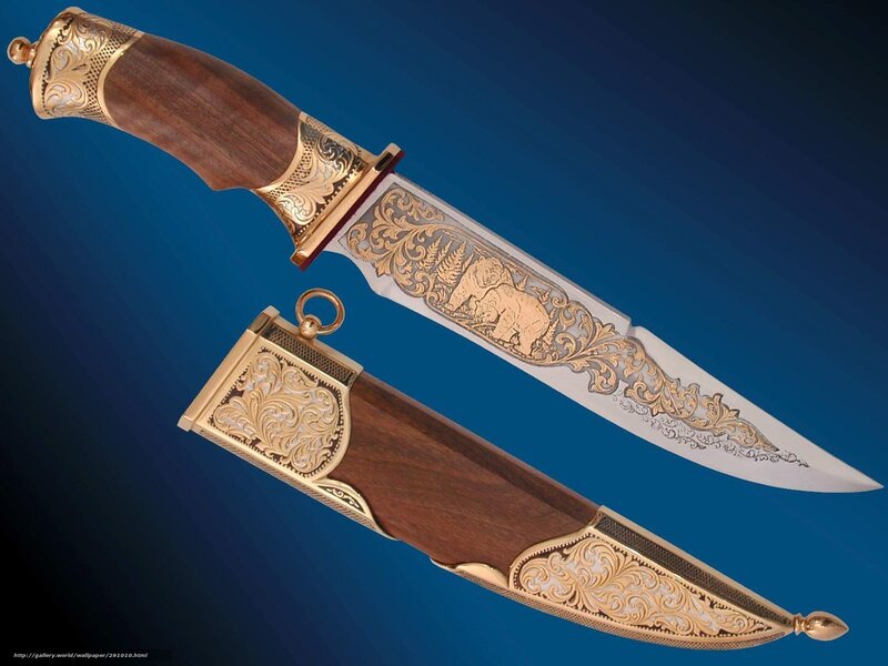 ornate knife with wooden handle
