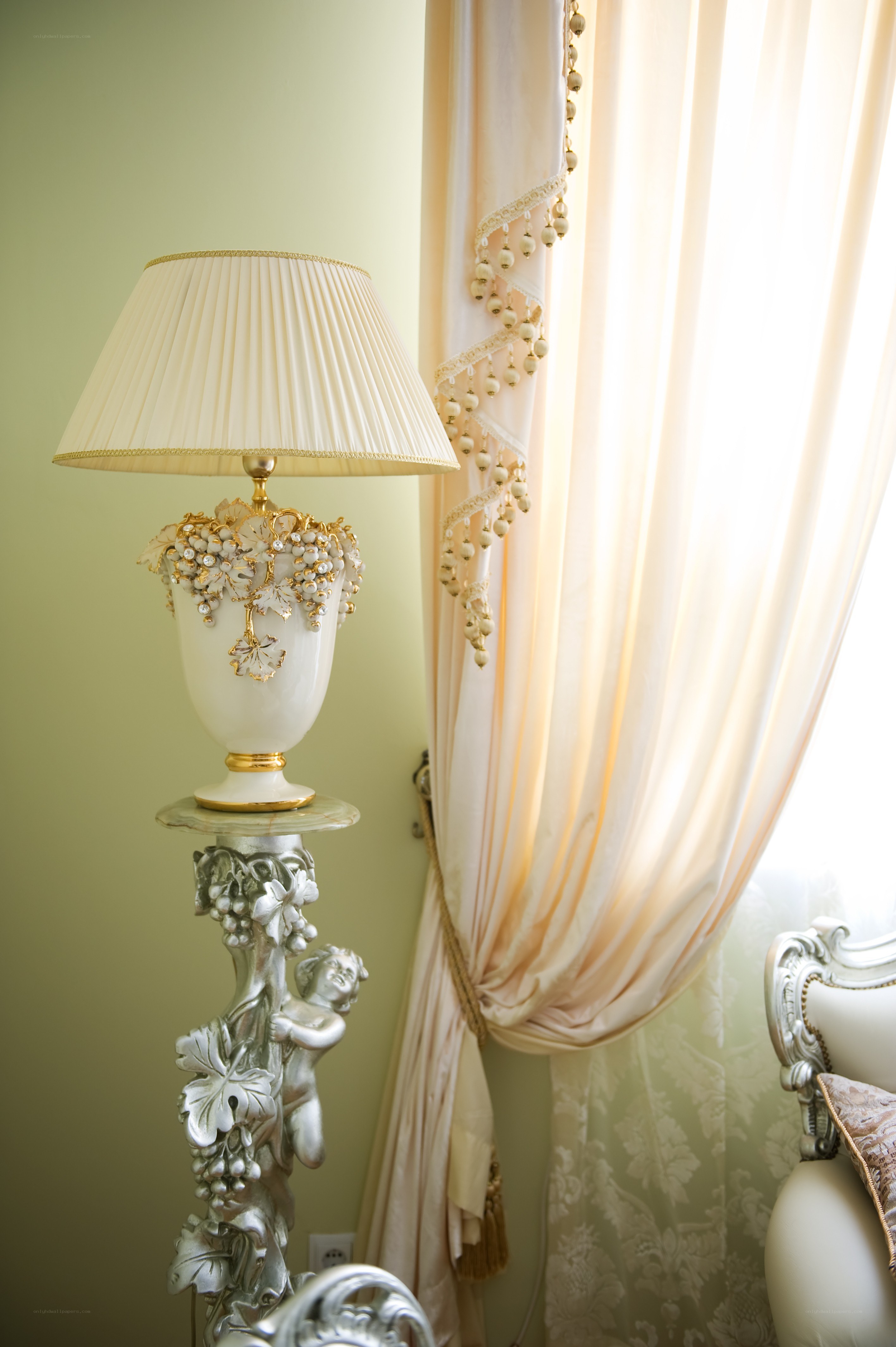 ornate lamp by window