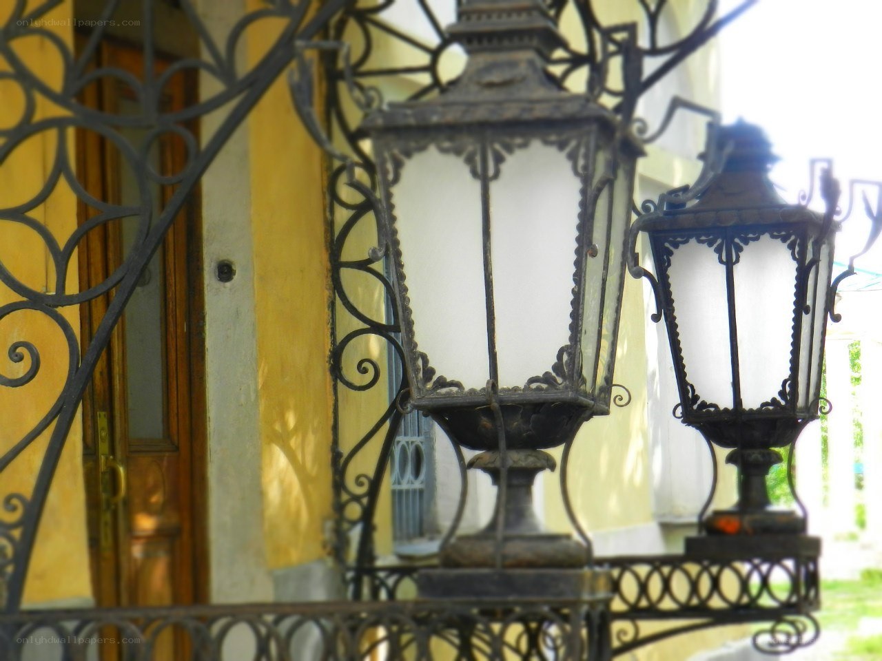 ornate lanterns on a balcony